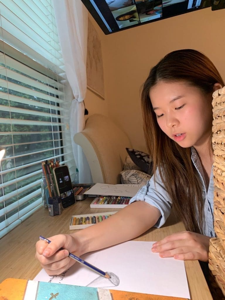 Teaching to Give's Lina Wu teaches a virtual art lesson.
