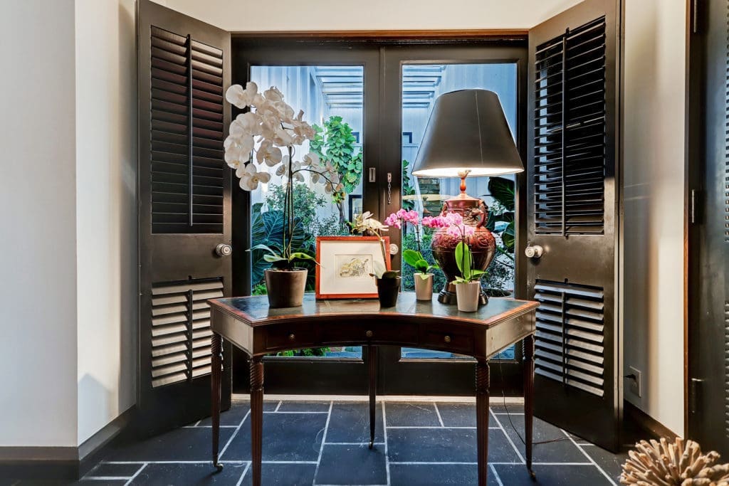 The entry from the front door reveals the  dual courtyards. (Photo by TK Images)