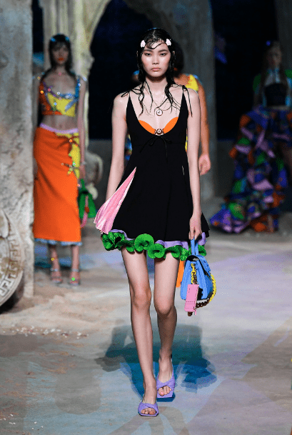 Houston model Sherry Shi walked the runway at the Versace show in black minidress with ruffled green hem. (Photo courtesy of Versace)
