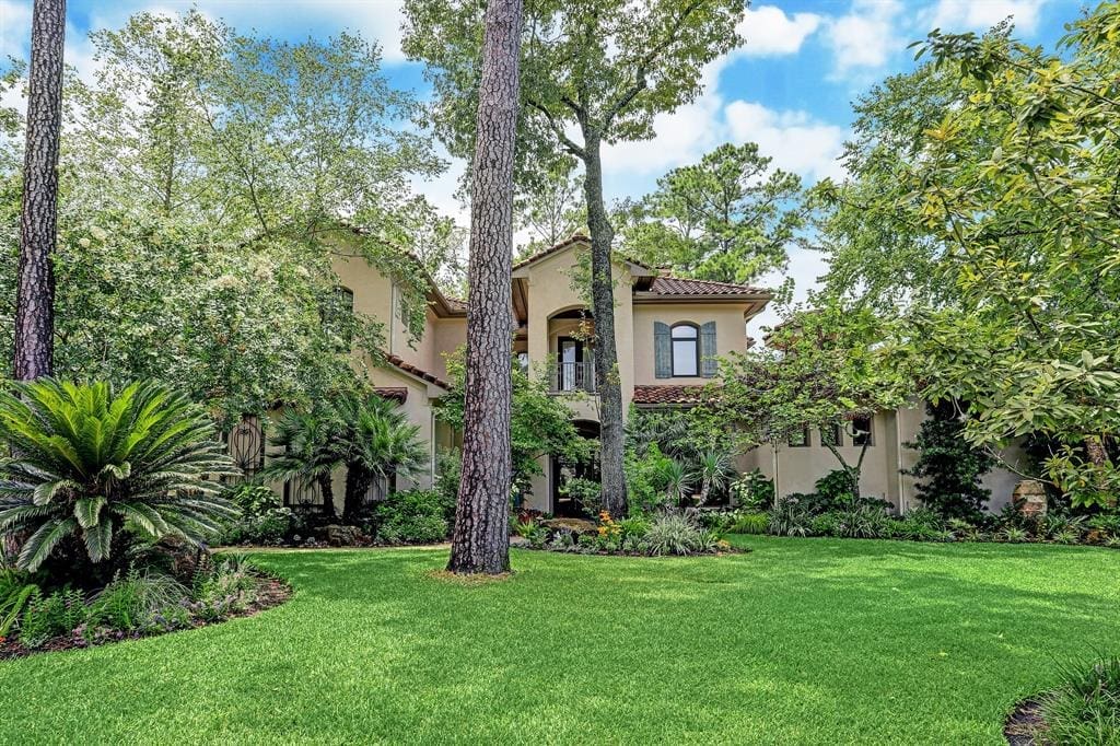 The Mediterranean charm begins with curb appeal.