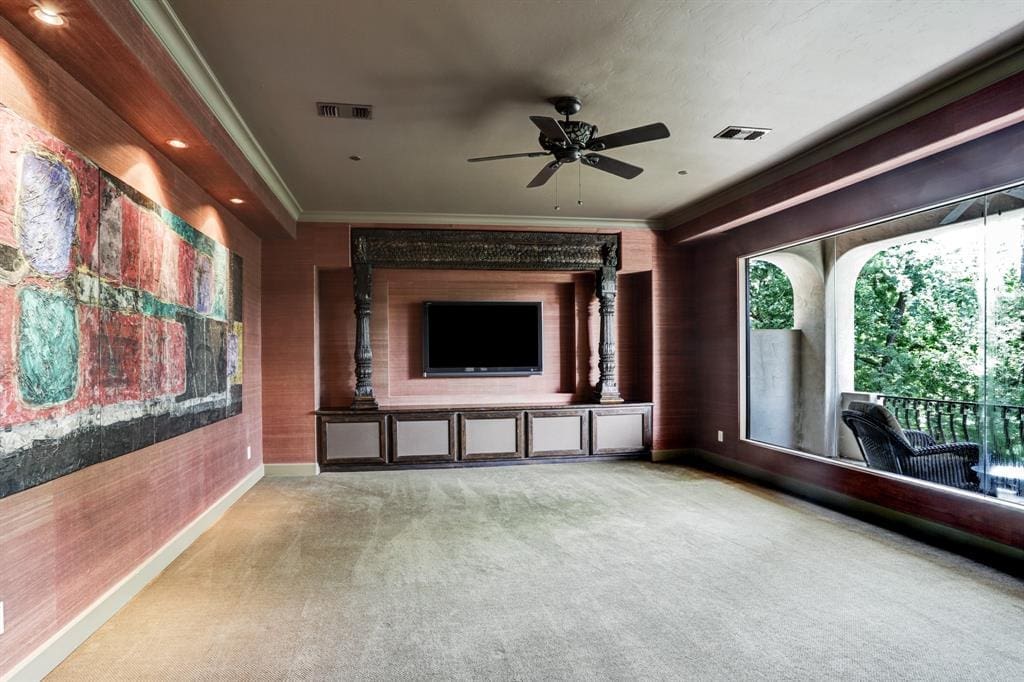 Second floor media room overlooks the pool.
