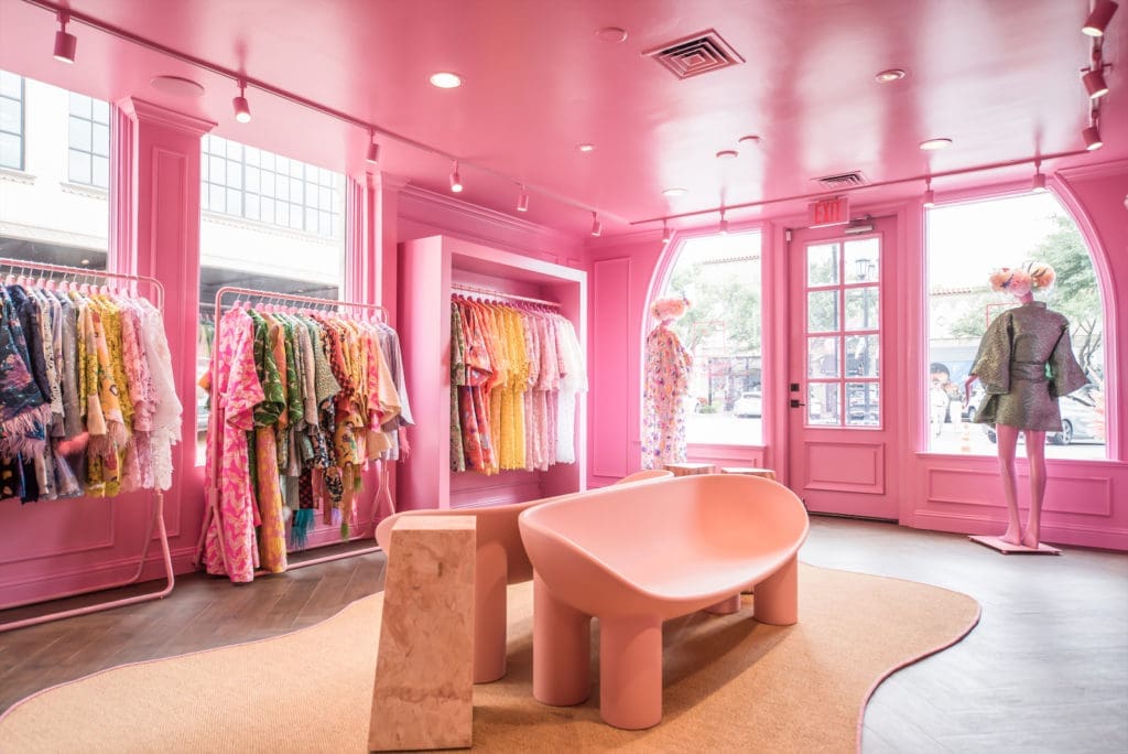 Interiors are styled to resemble a pink Parisian jewelry box. 