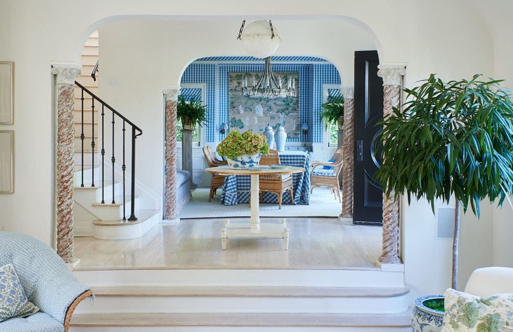 A beautiful view into the dining room of Mark Sikes's home, dressed in a blue and white biased gingham from Brunschwig & Fils. (Photo Amy Neunsinger)