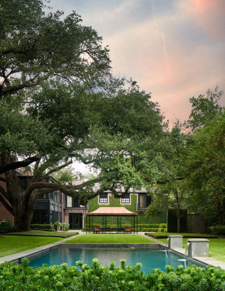 The grounds of 2 Longfellow Lane in Houston's exclusive Shadyside neighborhood are shaded by 100 year old oaks and surrounded by beautifully landscaping.  (Photo by Nathan Schroder/Douglas Elliman)
