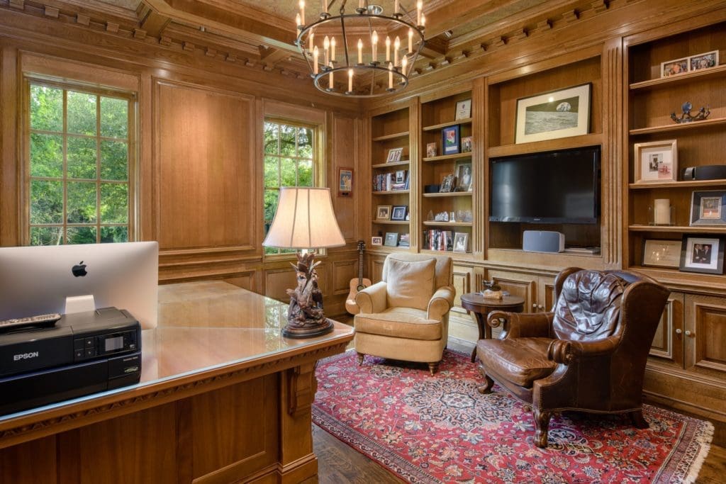 The wood paneled study. 