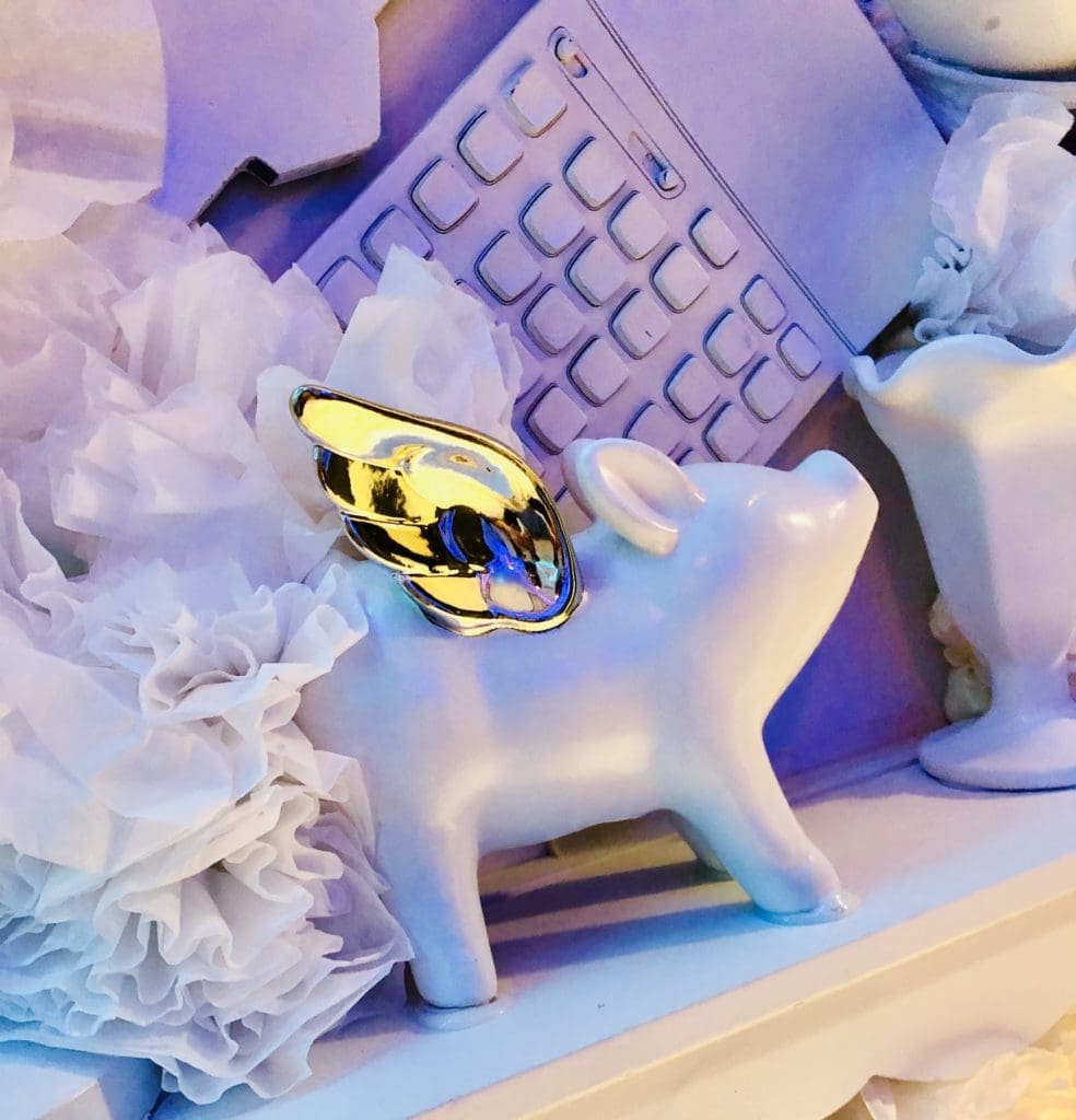 The only color remaining in the completely white room of "Eye Spy" is a pair of silver wings. (Photo by Jason Sanders)