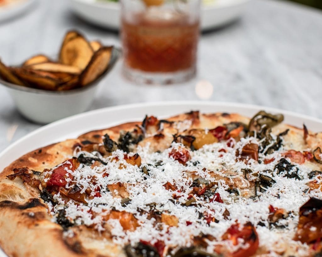 The Sporting Club serves its full menu until 11 pm and specialty pizzas until 2 am. (Photo by Corine Michel )