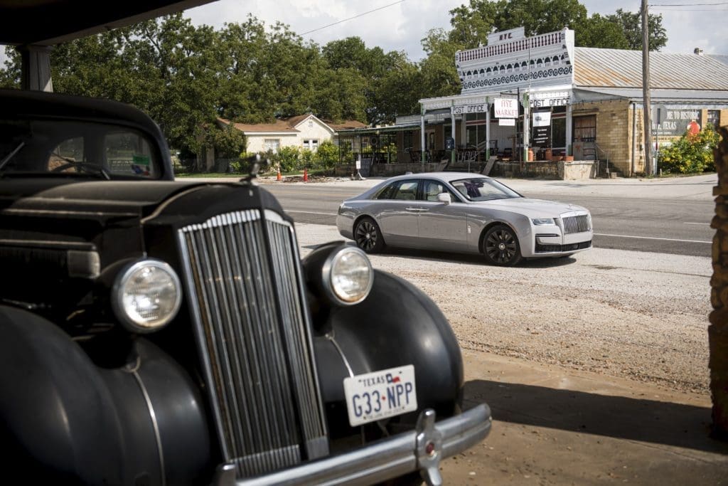 On a brief tour in the Austin area for its debut, the 2021 Rolls-Royce Ghost crosses paths with a vintage member of the British motorcar family. (Photo by James Lipman for Rolls-Royce)