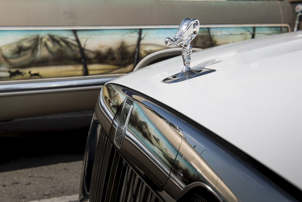 The Spirit of Ecstasy hood ornament recedes into the hood of the 2021 Rolls-Royce Ghost when the engine is turned off.  (Photo by James Lipman for Rolls-Royce)