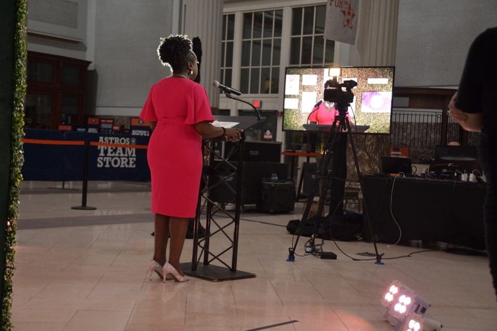 AVDA CEO Maisha Colter heading the program live from Union Station in Minute Maid Park. (Photo by Jerry Klumpp)