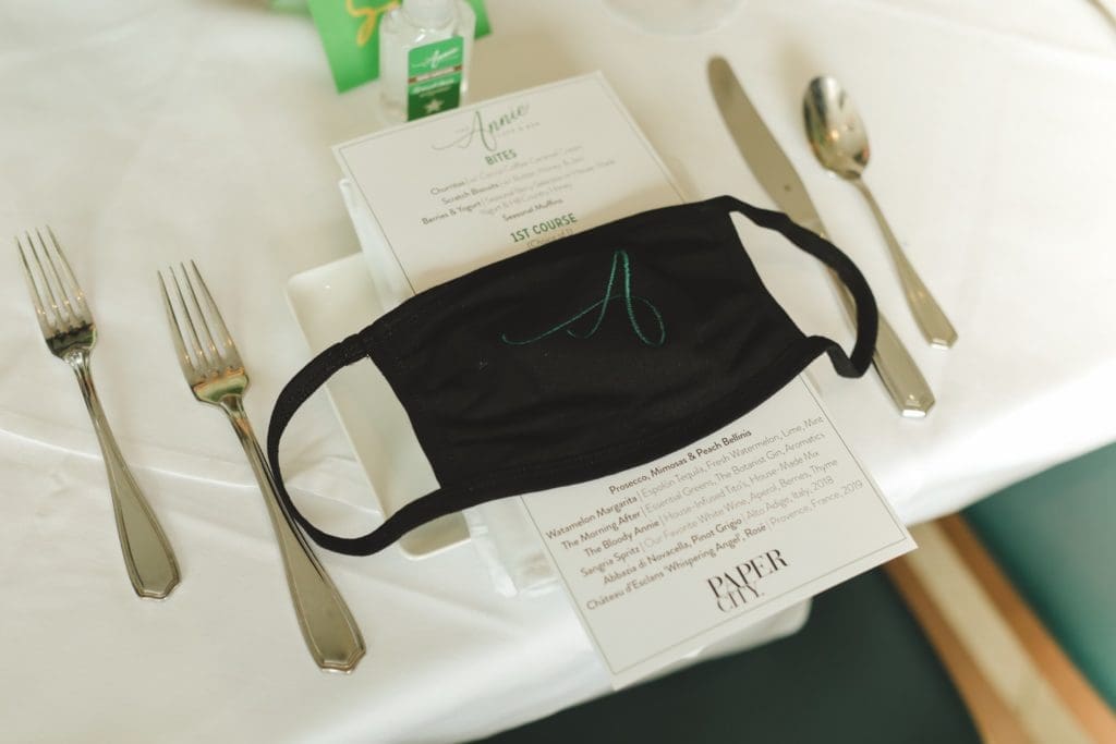 The Annie Cafe logo mask awaits each guest as she sits for the Sunday brunch extravaganza. (Photo by Johnny Than)
