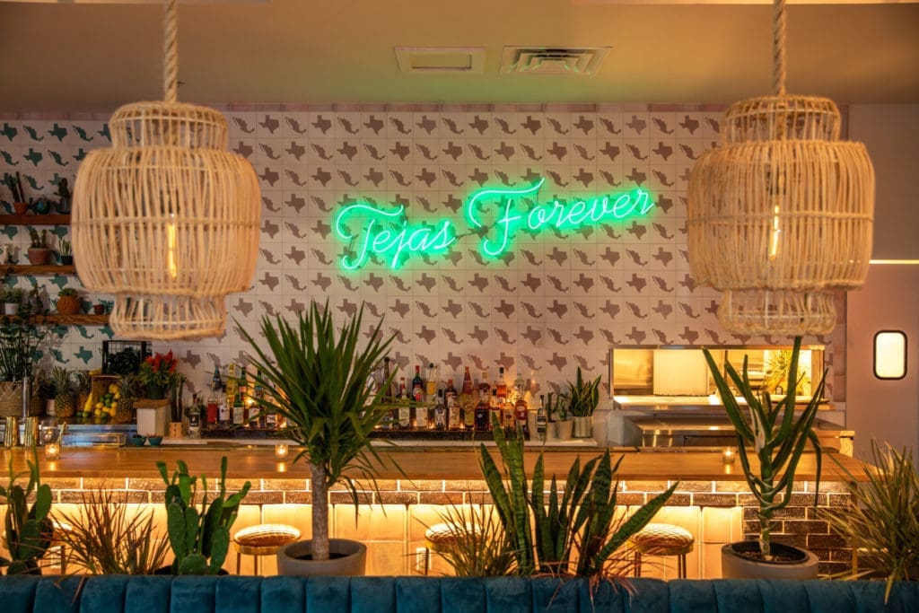 Tejas has been remodeled as a sit-down restaurant with darker and moodier vibes. (Courtesy)