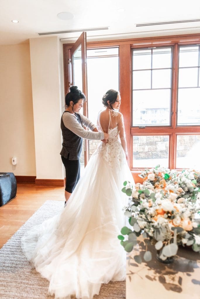 Bridal hair and makeup by Divine Beauty Artists.  (Photo by Lady Ilg Photography)