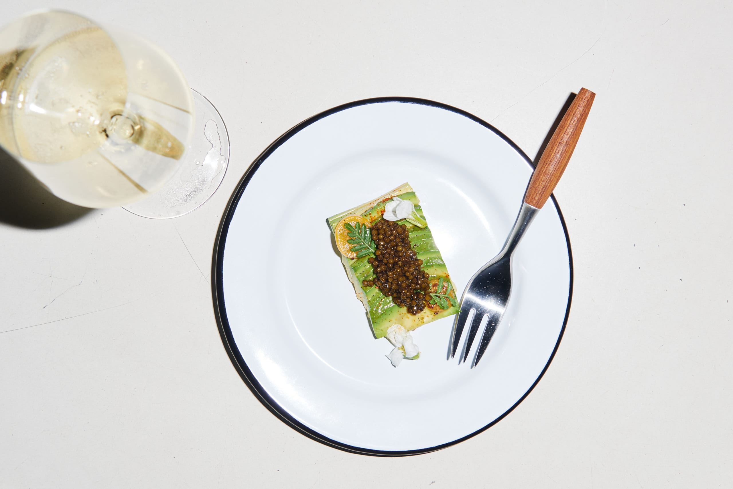 avocado and caviar canapés (Photo by Jonathan Zizzo)