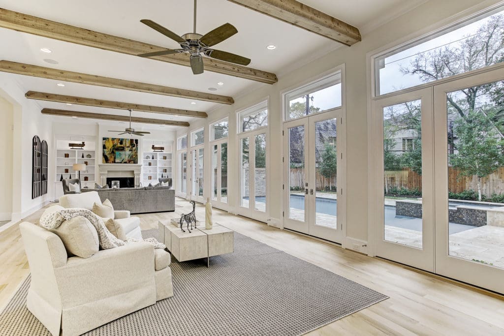 The 8,600 sq ft home custom home built by Stacey Fine Homes boasts 5 bedrooms and 6.2 baths.