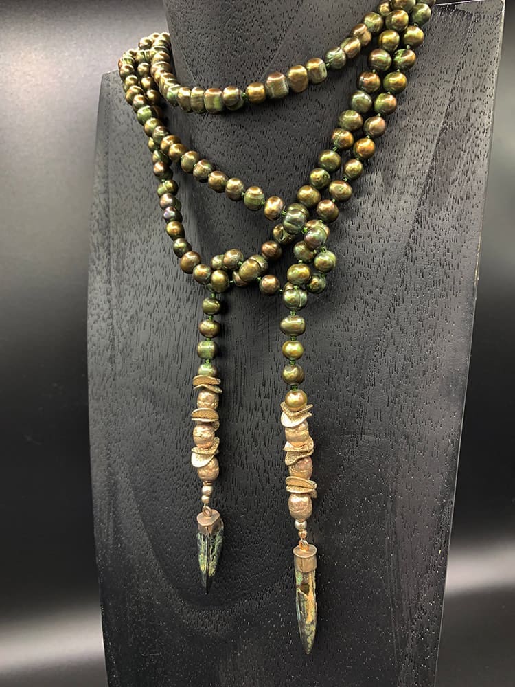 Green pearls and spear tips necklace.