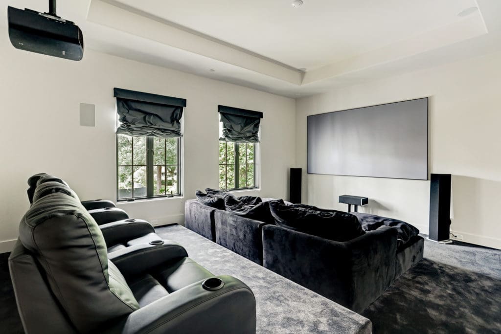 In addition to six bedrooms, the dwelling at 722 E. Friar Tuck Lane has a home theater.