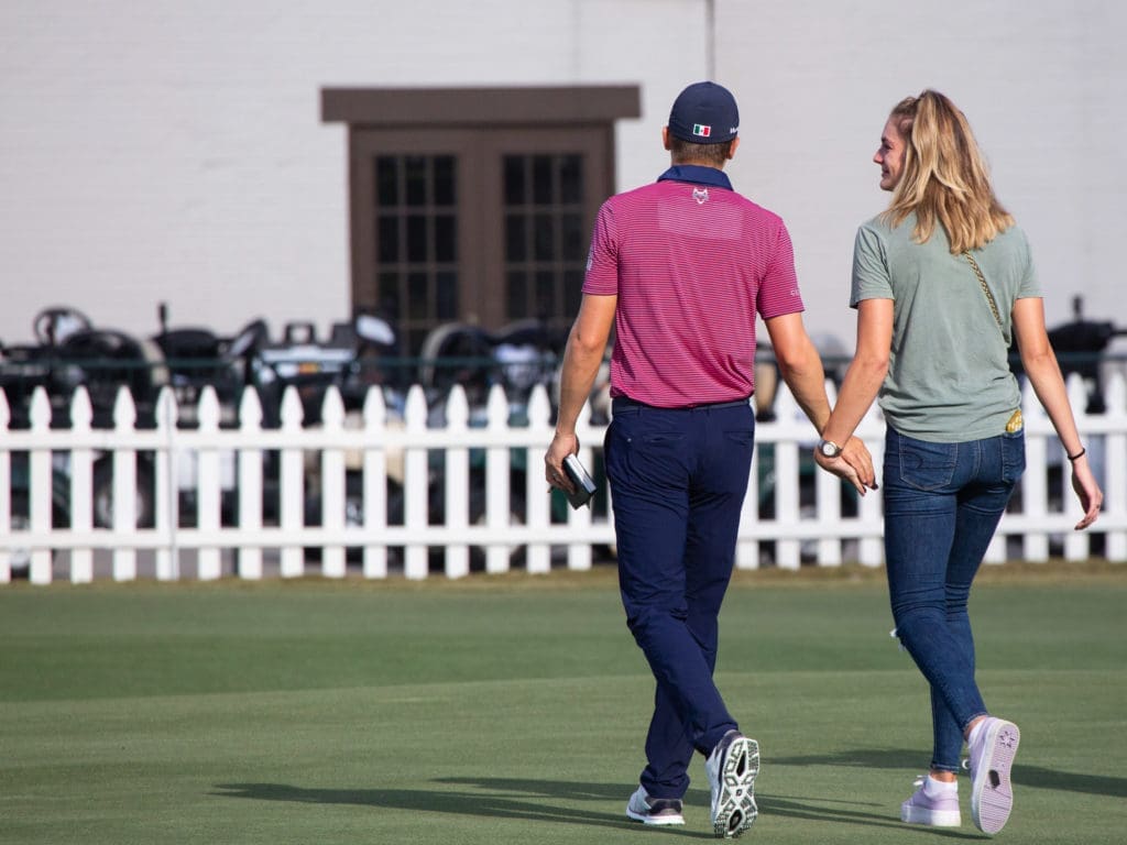 Carlos Ortiz and his wife Halley had some sweet moments after his first career win. (Photo by F. Carter Smith)