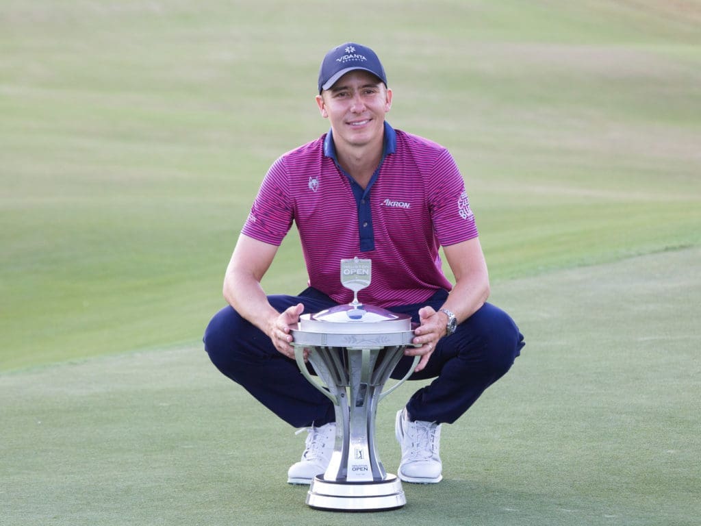 Carlos Ortiz finally had his trophy moment. (Photo by F. Carter Smith)