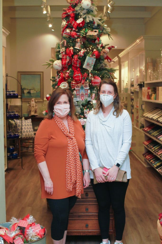 Lisa Vise, Ali Barron in Bering's stunning gift department where Christmas ornaments and candles are on every shopper's list.  (Photo by Chris P. Bachman )