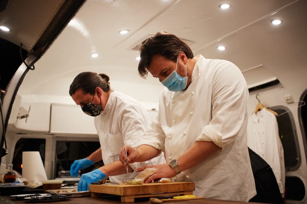 The team at work creating the decadent dinner (Photo by Jonathan Zizzo)