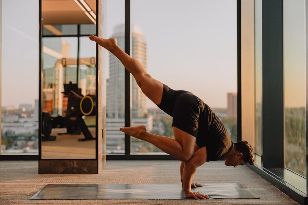 Pham is diligent in his yoga practice to balance out his successful career.