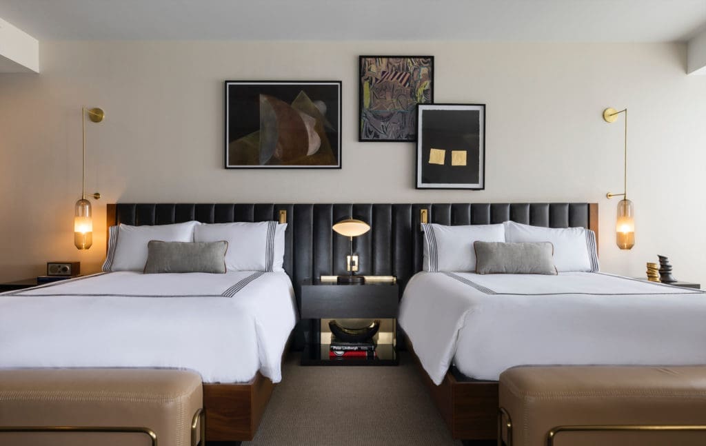 A corner guest room in the Thompson Dallas hotel. (Photo by Julie Soefer