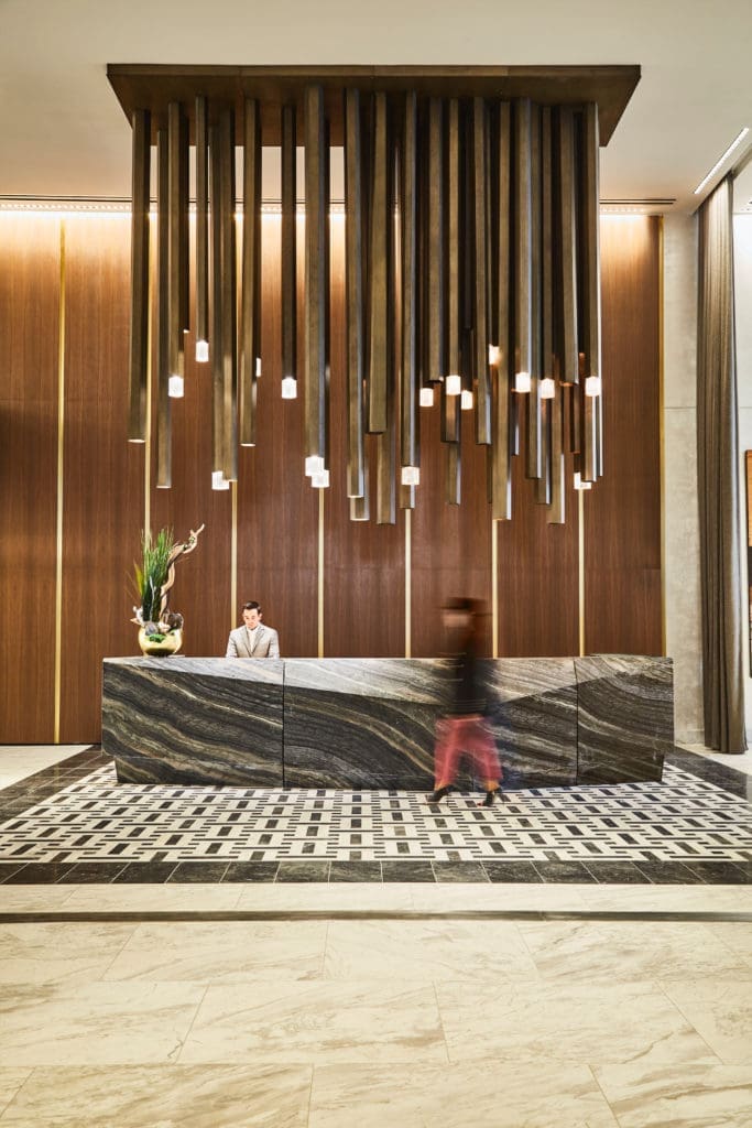 Thompson Dallas reception, with
restored teakwood and brass paneling. (Photo by Gustav Schmiege)