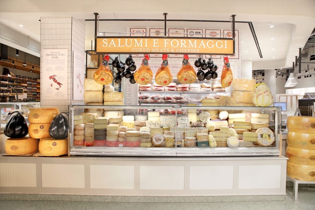 The Salumi & Formaggi stall includes five different types of prosciutto. (Photo by Allison David)
