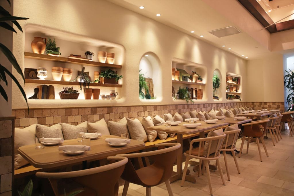 Cozy booths line the inside of Eataly Dallas' Terra. (Photo by Allison David)