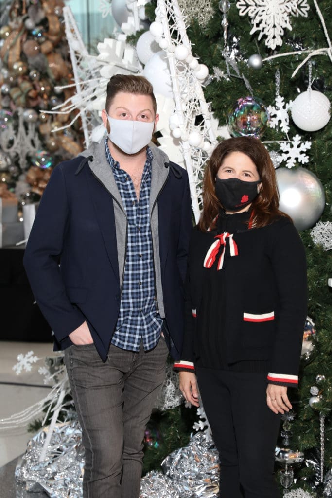 Signature Tree Designer Taylor DeMartino with lead sponsor H-E-B's Lisa Helfman.