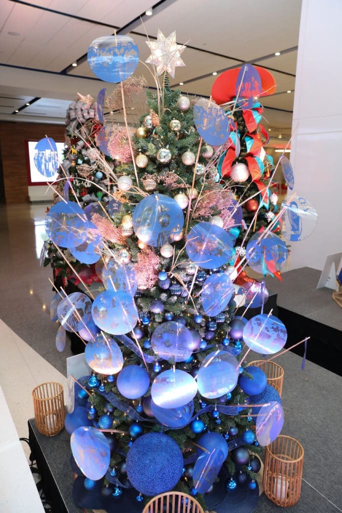 The Alley Theatre Deck the Trees display of decorated conifers. Where Unity and Diversity Thrive by Matt Manalo and sponsored by the Asian Pacific American Heritage Association.
