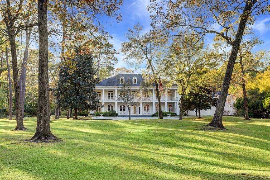 The 14,094 sq.ft. home at 27 Rivercrest Drive sits amid 3.5 acres.  