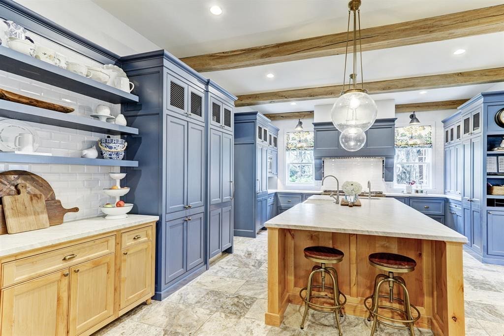 The country style kitchen at 3424 Sunset Boulevard enjoys contemporary amenities.
