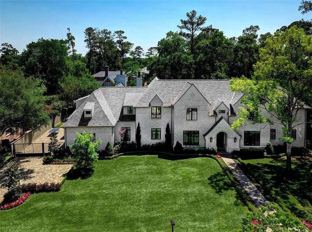 Six bedrooms and eight bathrooms at 11019 Kemwood provide plenty of beds for house party entertaining.