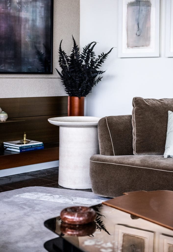 Custom rug designed by Joshua Rice and Travis LaMothe. Side table by Benjamin Wiener. (Photo by Robert Yu)
