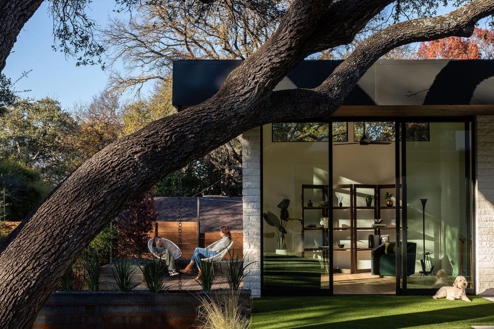 Preserving the heritage oak was key in Coxist Studio's design of the mid-century inspired home. (Photo by Jake Holt)
