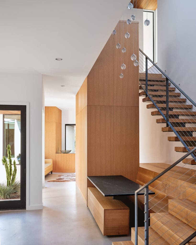 The Matt Fajkus Architecture addition met the client's desire for a private office, sitting area, mud room and powder room. (Photo  by Leonid Furmanksy & Matt Fajkus Architecture)