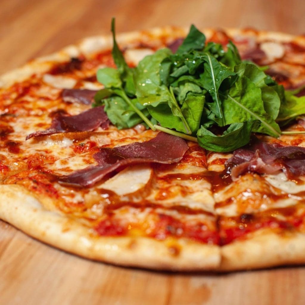 The Good Living pizza at Vector Brewing comes with prosciutto, arugula, and fig drizzle. (Courtesy) 