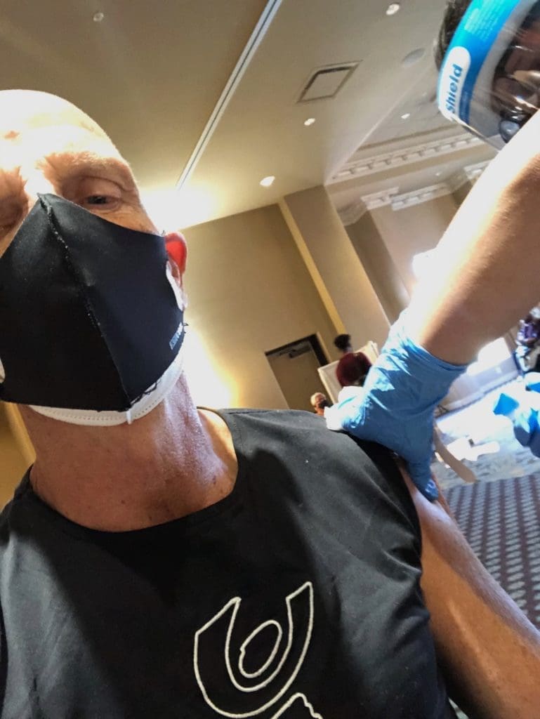 The article's author takes a selfie while receiving the Moderna vaccine. (Photo by Clifford Pugh)