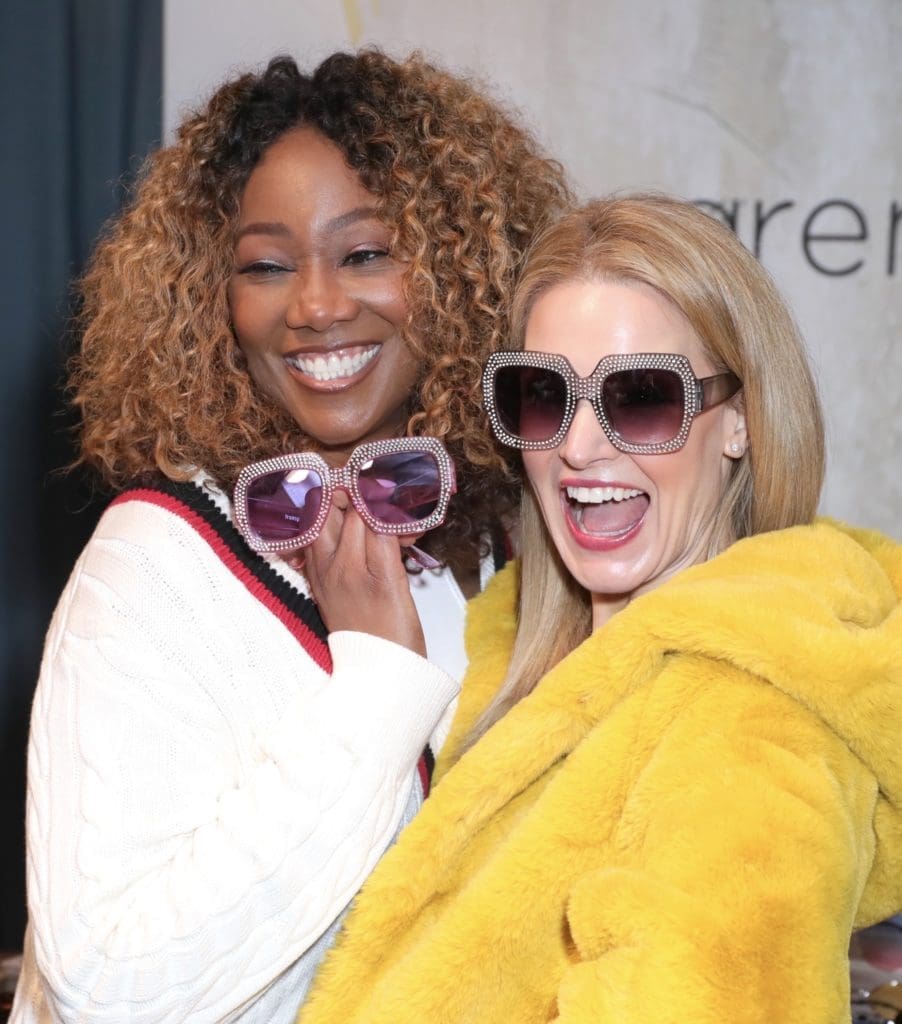 Sunglass designer and Houston mom Margot Hogan shares a moment with singing star Yolanda Adams. The transparent sunglasses are a must. (Instagram photo)