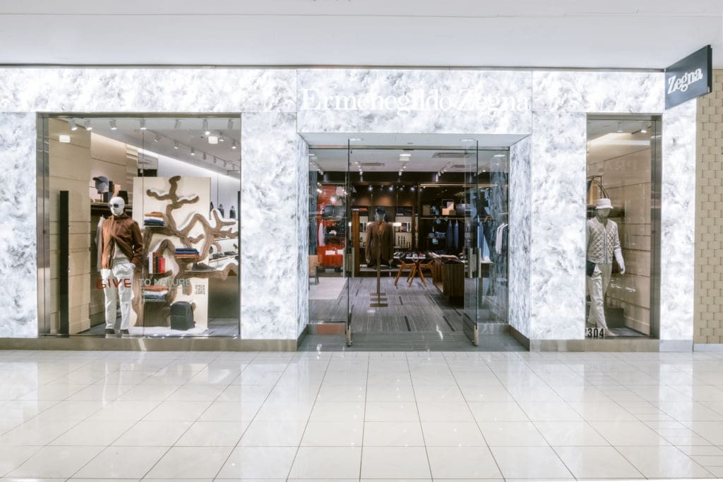 Zegna moves its Galleria boutique as a neighbor to Prada, creating an Italian fashion powerhouse corner. (Photo ©kellidurham)