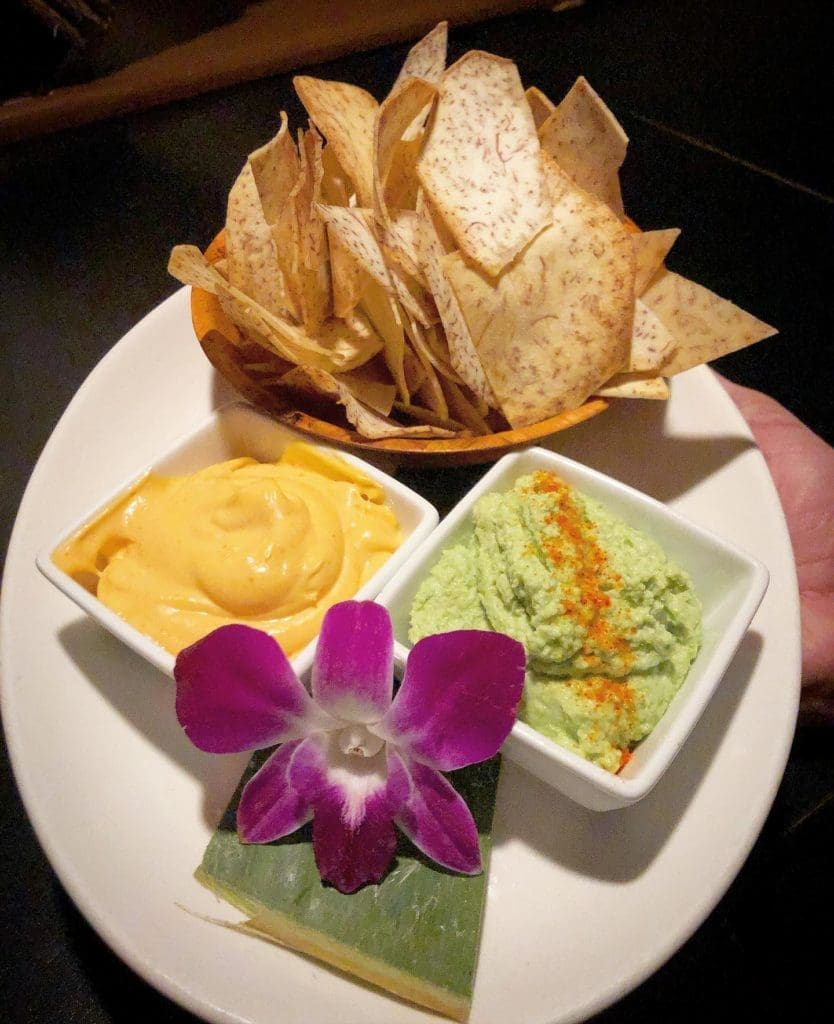 Make sure to start with the tarot chips with Sriracha aioli and edamame dips at Swizzle. (Courtesy of Swizzle)