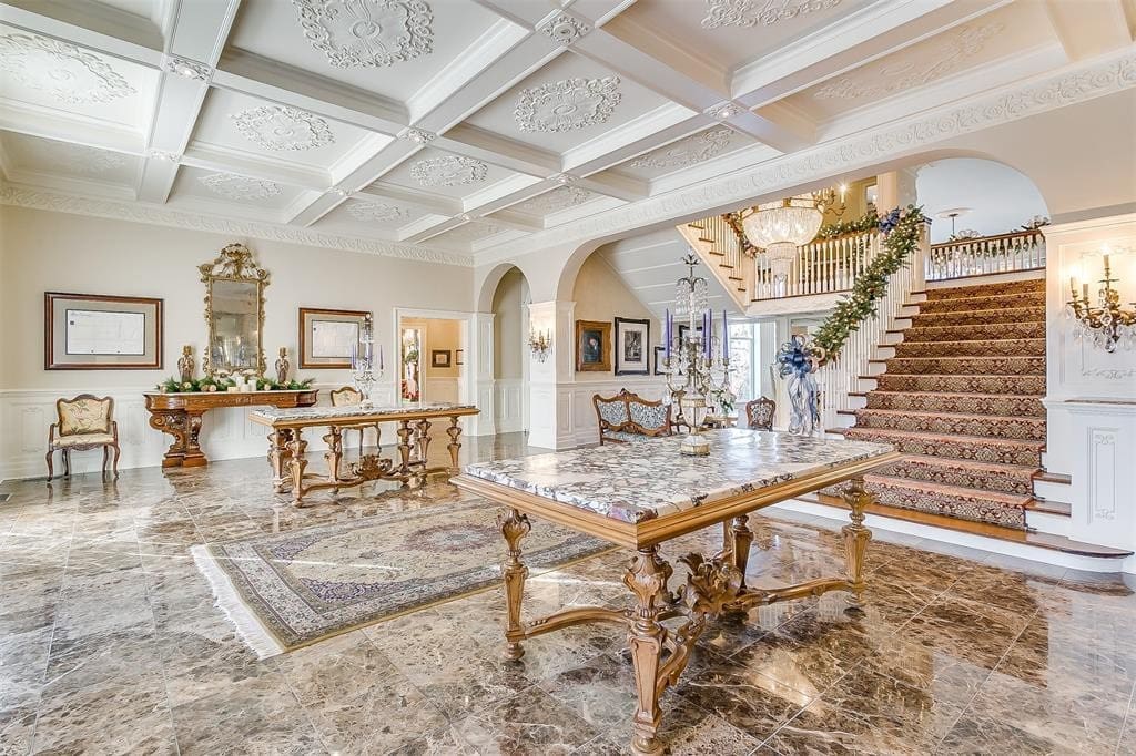 An entry hall like none-other greets you as you enter 5100 Crestline Road.