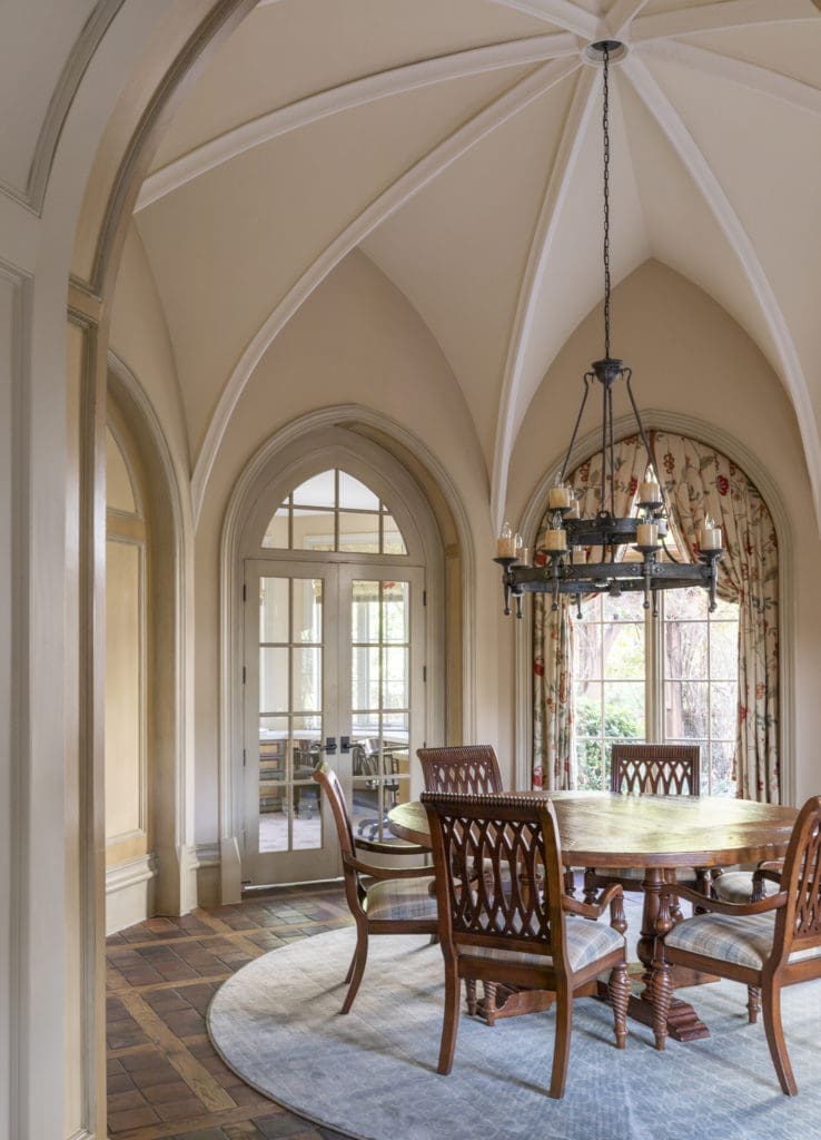 The breakfast room at 3996 Inverness features a 14 ft. groin vaulted ceiling and reclaimed terra cotta and timber floors  (Photo by Julie Soefer)