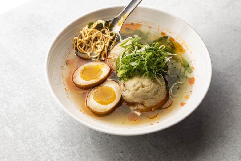 The Local Foods Market menu includes creative dishes such as Chicken Matzo Ramen soup.  (Photo by Julie Soefer)