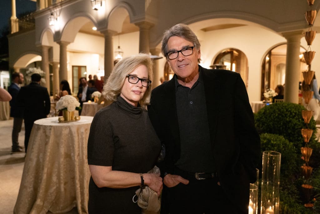 Anita and former Governor Rick Perry, Tony Buzbee's best man, join the engagement party in a Memorial area swankienda. 