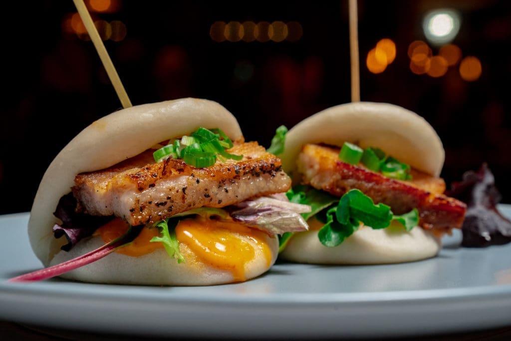 Pork belly buns are a must-try shareable dish at Anju. (Courtesy)