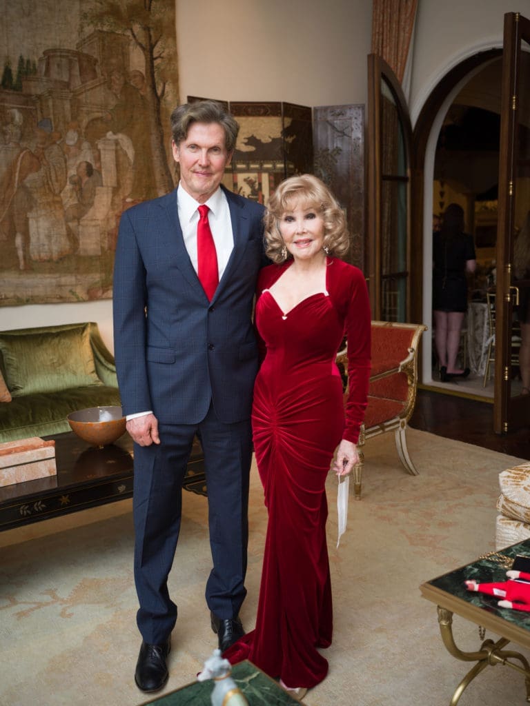 Beau King escorts his mother, Joanne King Herring, at the engagement party of Frances Moody and Tony Buzbee.