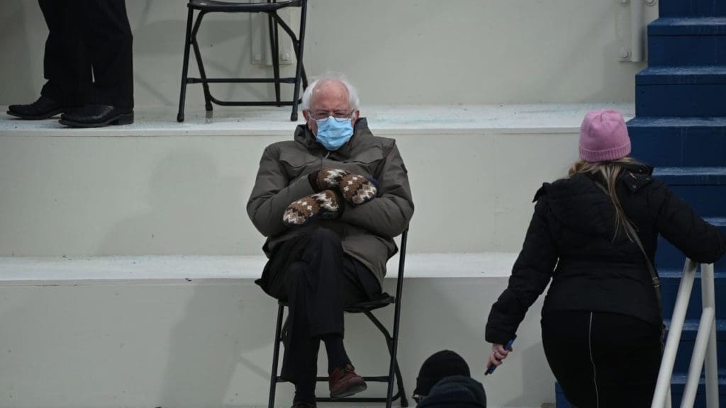 Bernie Sanders models the look that launched a thousand memes. (Photo by Brendan Smialowski/AFP via Getty Images).